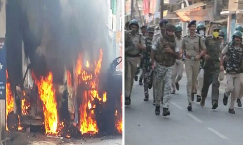 बिहार : मुंगेर हिंसा के बाद ड्यूटी से हटाए गए DM और SP, पुलिस ने किया फ्लैग मार्च