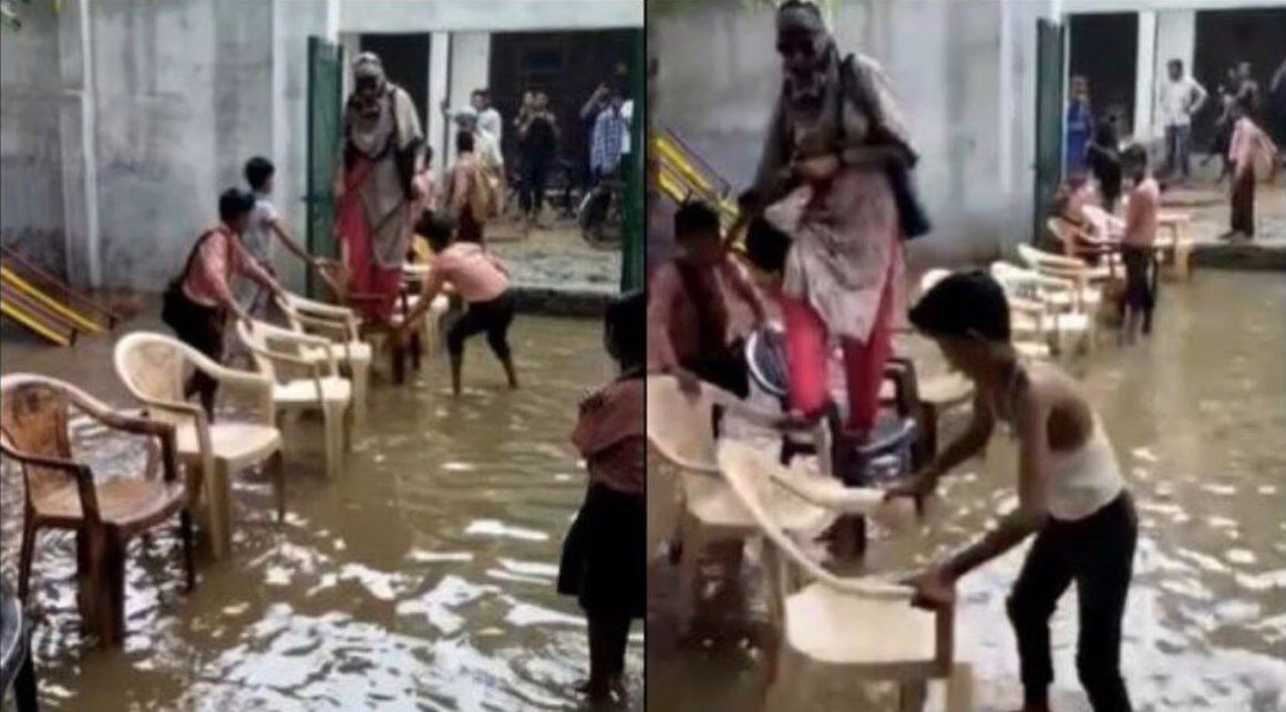 Mathura News : स्कूल बना तालाब, कुर्सियों पर पैर रखकर पहुंचीं शिक्षिका, वीडियो हुआ वायरल
