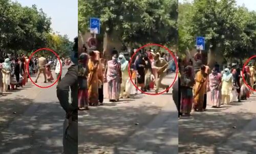 नोएडा पुलिस की गुंडागर्दी, राशन के लिए लाइन में खड़ी महिलाओं पर बरसाईं लाठियां